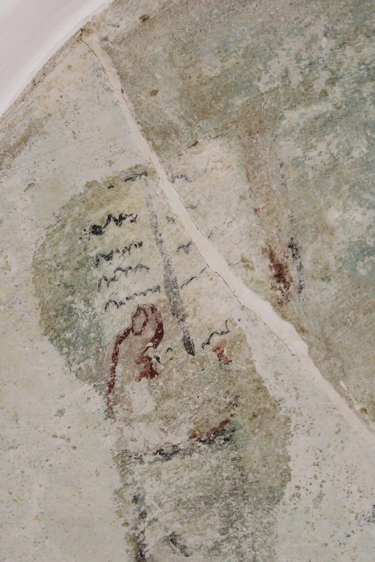 Un détail de la main du personnage mineur dans le deuxième cartouche